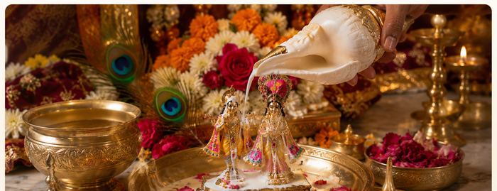 Sankha Abhishek — sacred conch abhishek poured over Sri Sri Radha Madhava ji